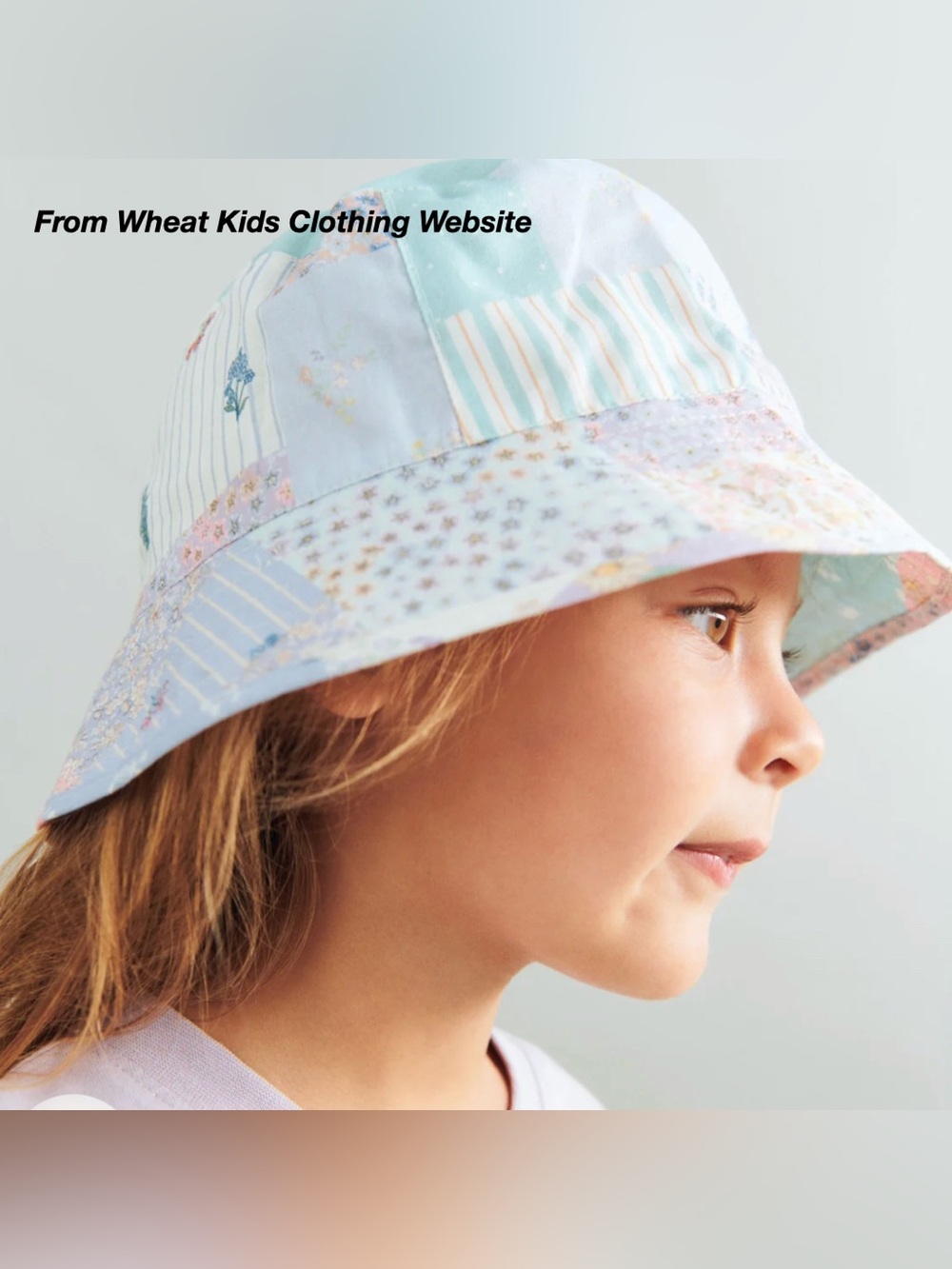 NWT: WHEAT ALEC BUCKET HAT IN PATCHWORK FLOWERS (3-5Y)